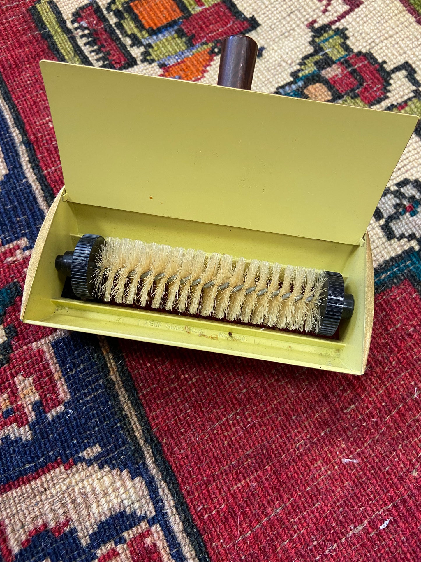 Antica spazzola a rullo raccoglibriciole PerkSwiss